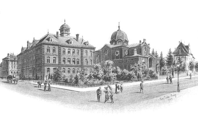 Die Knabenschule um 1903 mit der damaligen Synagoge